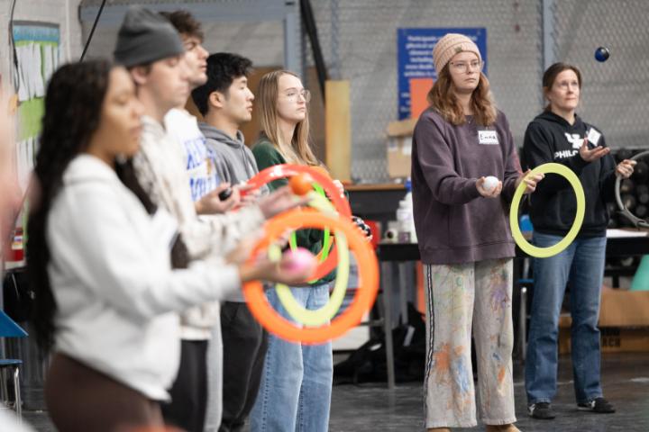 Students working with hoops